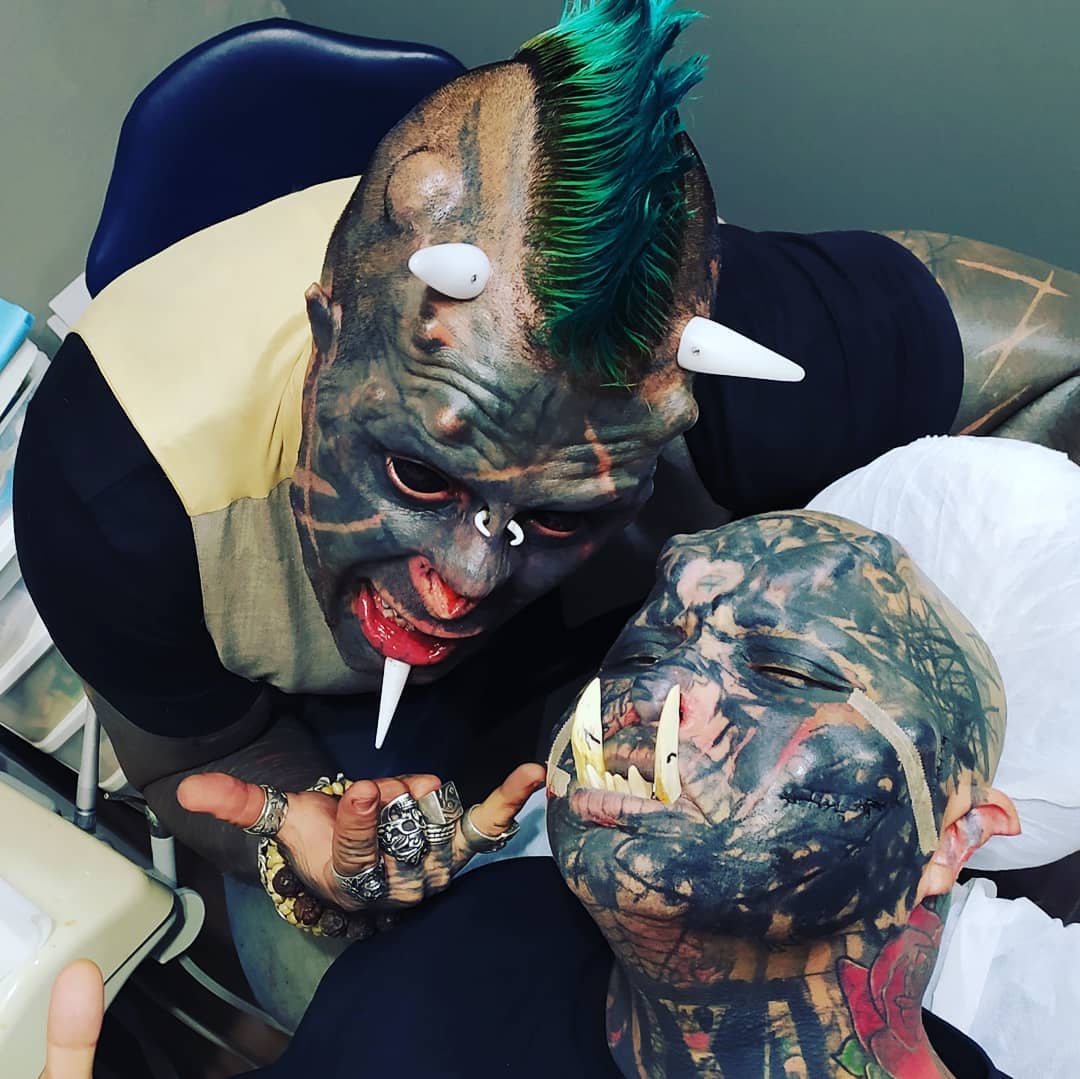 Tattoo Artist Gets Tusks Over His Teeth To Look Like An Orc