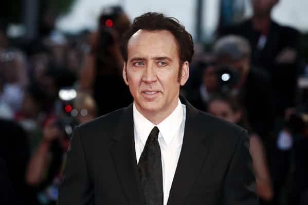 nicolas cage dinosaur bid, Celebrity weird facts, strange true stories about celebs, celeb facts that will make you rethink them forever